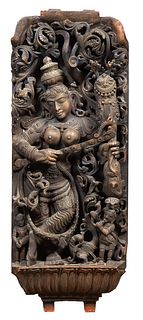 Large Balinese Deep Relief Intricately Carved Wood Panel, early 20th c., of a female deity, H.- 42 1/2 in., W.- 16 in., D.- 4 1/2 in.