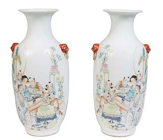 Pair of Chinese Qianjiang Baluster Porcelain Vases, 20th c., with integral lions' head ring handles, the sides decorated with children at play, H.- 14