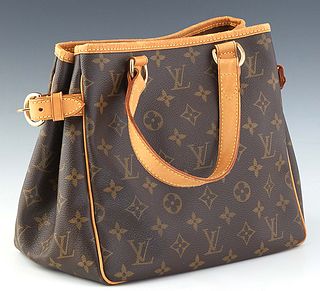 Louis Vuitton Batignolles PM Shoulder Bag, in brown monogram coated canvas with golden brass hardware and vachetta straps, opening to a canvas lined i