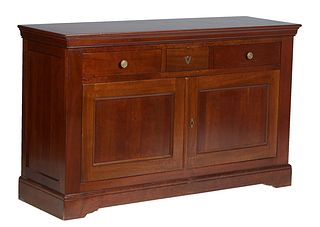 French Provincial Louis Philippe Carved Cherry Sideboard, early 20th c., the rectangular top over two frieze drawers above double cupboard doors, on a