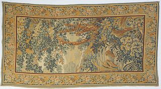 French Machine Made Tapestry, 20th c., of trees and flowers in a landscape, 9' 4. X 4' 11.
