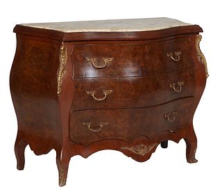 Louis XV Style Carved Walnut Ormolu Mounted Bombe Marble Top Commode, 21st c., the inset tan and creme bowfront marble over three deep bowed drawers, 