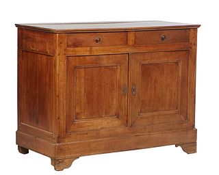 French Louis Philippe Carved Cherry Sideboard, 19th c., the rectangular top over two setback frieze drawers over double cupboard doors, on a plinth ba