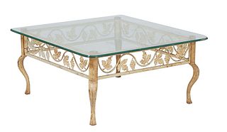 Wrought Iron Glass Top Coffee Table, 20th c., the square rounded corner plate glass top over a pierced scrolled grape leaf and grape bunch skirt, on c