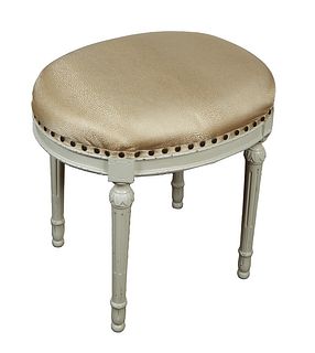 Louis XVI Style Polychromed Walnut Oval Stool, 20th c., the cushioned top over a reeded skirt, on turned tapered reeded legs, in gold jacquard fabric 