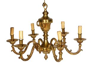 French Gilt Bronze Louis XV Style Six Light Chandelier, late 19th c., with a tapered reeded urn support issuing six curved leaf relief arms with bronz