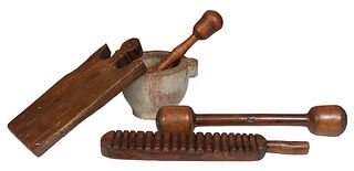 Group of Five Kitchen Items, 19th c., consisting of a brown marble mortar; two turned wood double pestles; an oak cutting board; and a wood mold, Mort