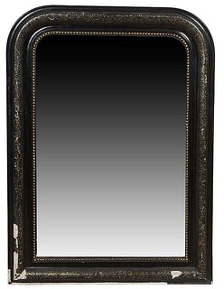 French Louis Philippe Ebonized Gesso Overmantel Mirror, c. 1880, with gilt highlights, the incised arched frame over an arched plate with a beaded lin