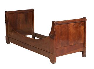 French Louis Philippe Carved Walnut Daybed, 19th c., the rolling pin sleigh ends joined by a curved front rail and a rectangular rear rail, H.- 31 1/2