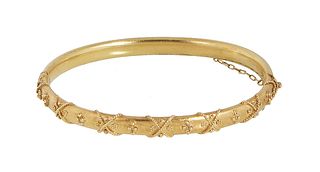 English 15K Yellow Gold Decorated Hinged Bangle Bracelet, c. 1900, with a relief twisted rope and floral decorated top, with a safety chain, H.- 3/16 