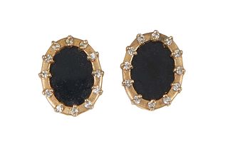 Pair of 14K Yellow Gold Stud Earrings, the oval black onyx stones within a border of twelve tiny round diamonds, Onyx- H.- 5/8 in., W.- 1/2 in., Prove