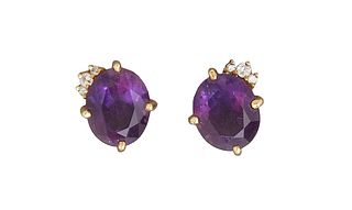 Pair of 18K Yellow Gold Amethyst Stud Earrings, the oval app. 5 carat amethysts mounted with a three tiny diamond side crown, with screw posts, Total 