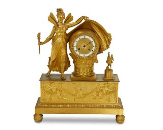 A French Empire-style gilt-bronze fairy mantle clock