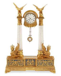 A large French Empire-style gilt-bronze mantle clock