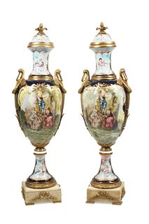 A pair of Sevres-style porcelain urns