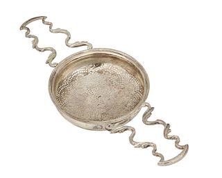 An English silver punch strainer
