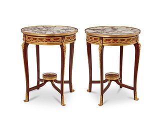 A pair of French Louis XV-style lamp tables