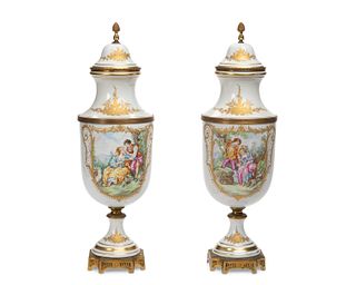 A pair of Sevres-style garniture urns