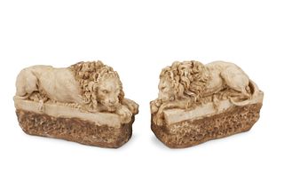 A pair of Italian carved marble lion sculptures