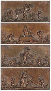A set of four bronze wall plaques