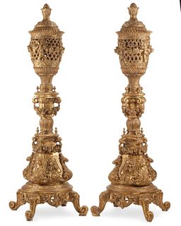 A pair of Italian Louis XV-style giltwood torchieres
