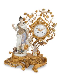 A French bronze porcelain mantle clock