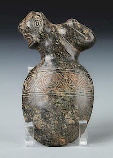 Taino Reclining Figure Atop an Ax Form (1000-1500 CE)