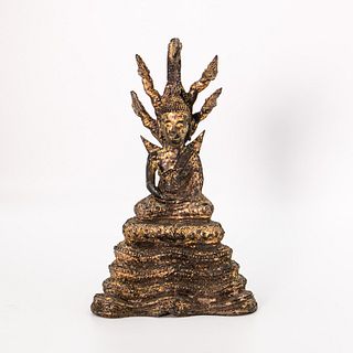 A Gilt Bronze Seated Buddha  | พระพุทธรูปสัมฤทธิ์กะไหล่ทองปางนาคปรก