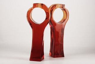 Pair of red acrylic abstract candle holders 