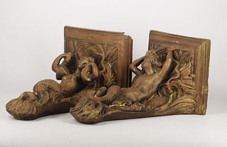 Pair of terracotta supports with mermaid figures. Baroque style.