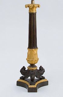 EMPIRE STYLE PATINATED BRONZE AND GILT-METAL COLUMN-FORM CANDLESTICK, MOUNTED AS A LAMP