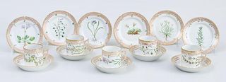 FIVE ROYAL COPENHAGEN PORCELAIN CYLINDRICAL CUPS, FIVE SAUCERS AND SIX BUTTER PLATES, IN THE FLORA DANICA PATTERN