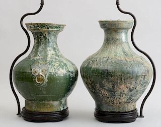 TWO SIMILAR HAN IRIDESCENT GREEN-GLAZED POTTERY JARS, MOUNTED ON LAMP STANDS