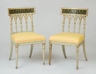 PAIR OF ITALIAN NEOCLASSICAL PAINTED AND PARCEL-GILT SIDE CHAIRS