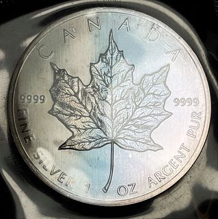 Toned 1989 Canada Maple Leaf 1 ozt Silver OG Packaging