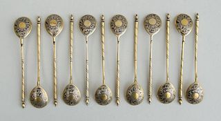 SET OF TWELVE RUSSIAN GILDED SILVER AND NIELLO TEASPOONS