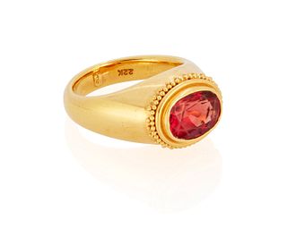 A natural orangy red spinel ring