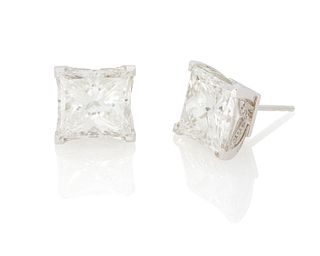 A pair of princess-cut diamond stud earrings worn by Erika Girardi