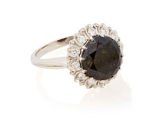 A black diamond and near colorless diamond ring