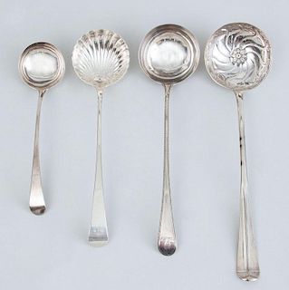 THREE GEORGE III SILVER PUNCH LADLES AND A GEORGE III SILVER SAUCE LADLE