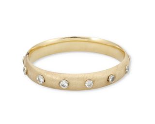 A diamond hinged bangle bracelet