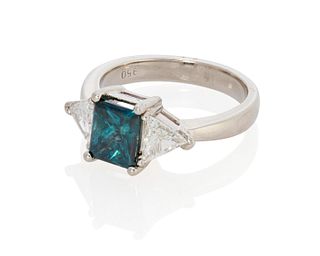 An irradiated blue diamond ring