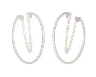 A pair of diamond double hoop earrings