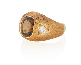 A chrysoberyl and diamond ring