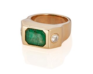 An emerald doublet and diamond ring