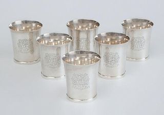 ASSEMBLED SET OF SIX GEORGE III SILVER BEAKERS WITH LATER MATCHING ARMORIALS