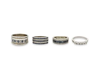 A group of four sapphire and diamond bands