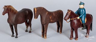 Three carved and painted horses, 19th/20th c.