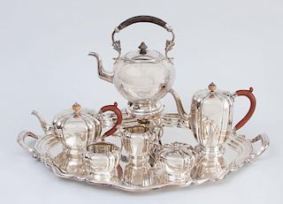 ENGLISH SILVER FIVE-PIECE TEA AND COFFEE SERVICE, IN THE GEORGE II STYLE, A SILVER-PLATED KETTLE ON WARMING STAND AND A REED & BARTON TWO-HANDLED TRAY
