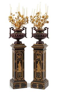A Pair of French Enameled Cast Iron and Gilt Bronze Candelabra with Associated Painted Pedestals